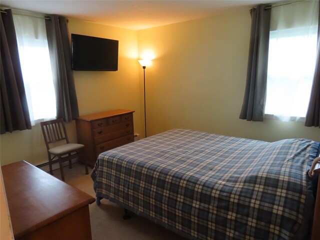 565 18th St, West Babylon, NY 11704 - view of carpeted bedroom