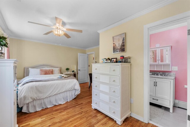 bedroom with crown molding, a ceiling fan, a baseboard radiator, light wood-type flooring, and a sink