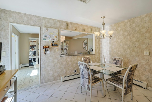 tiled dining space with baseboards, plenty of natural light, a baseboard heating unit, and a chandelier