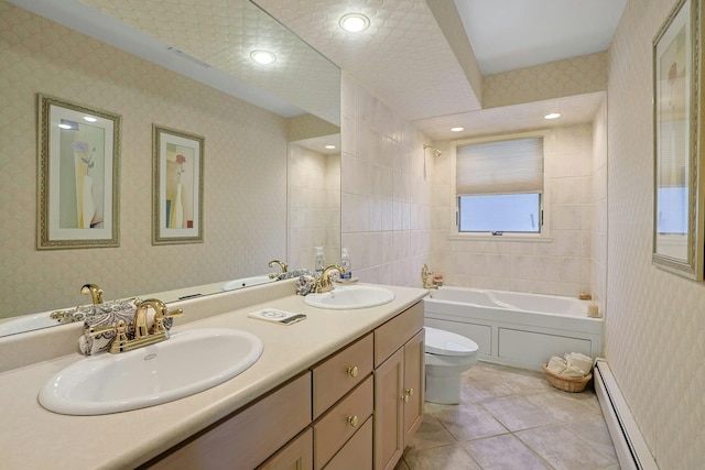 full bathroom featuring tile patterned flooring, a sink, baseboard heating, and toilet