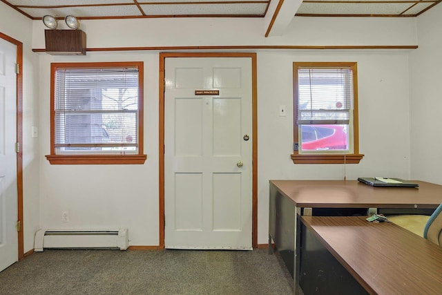 entryway featuring baseboards and baseboard heating