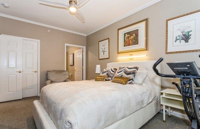 carpeted bedroom featuring crown molding