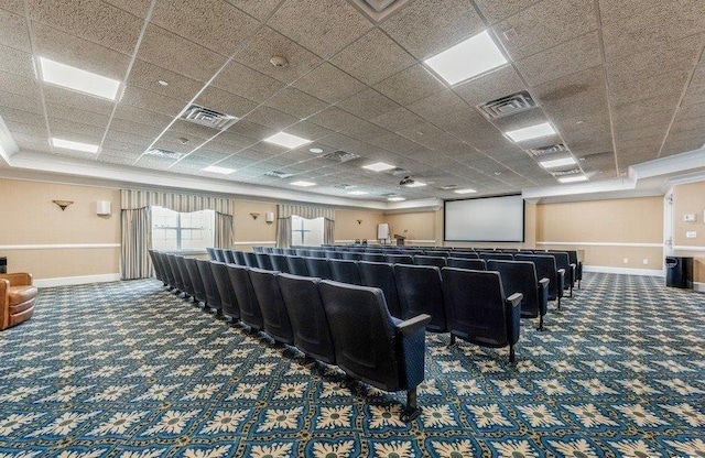 interior space featuring carpet floors, visible vents, and baseboards