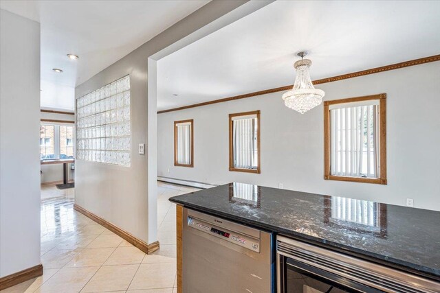 21-09 48th St, Astoria, NY 11105 - kitchen featuring dishwasher, light tile patterned floors, baseboards, a baseboard radiator, and a notable chandelier