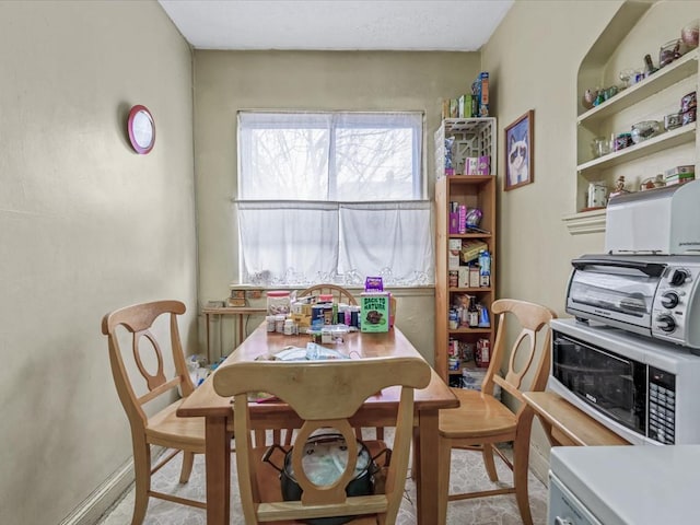 dining space featuring a toaster