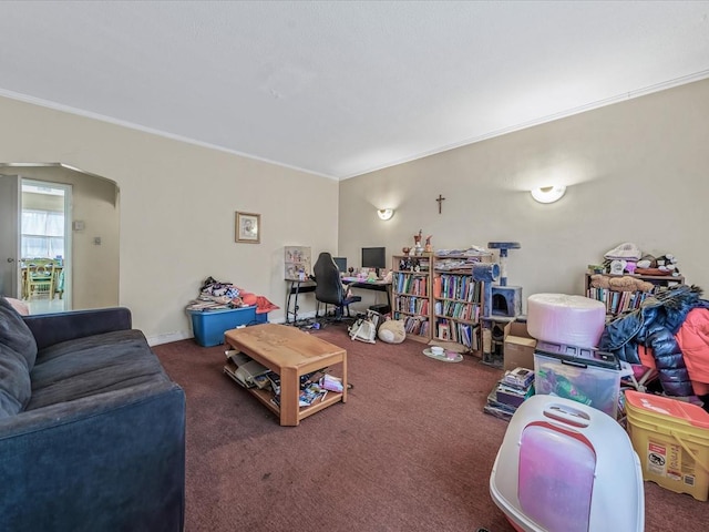 carpeted living room with crown molding