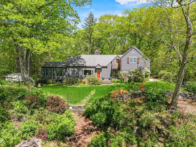 1391 Hunterbrook Rd, Yorktown Heights, NY 10598 - view of front facade with a chimney and a front yard