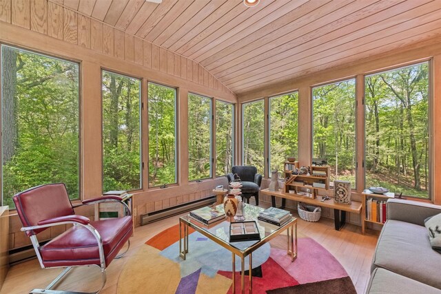 1391 Hunterbrook Rd, Yorktown Heights, NY 10598 - sunroom / solarium with a baseboard heating unit, vaulted ceiling, and an outdoor living space