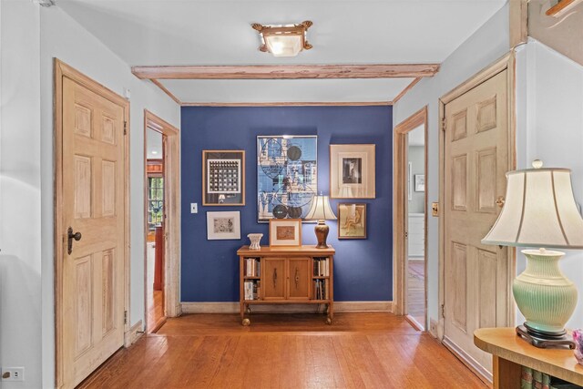 1391 Hunterbrook Rd, Yorktown Heights, NY 10598 - entryway with wood finished floors, beamed ceiling, and baseboards