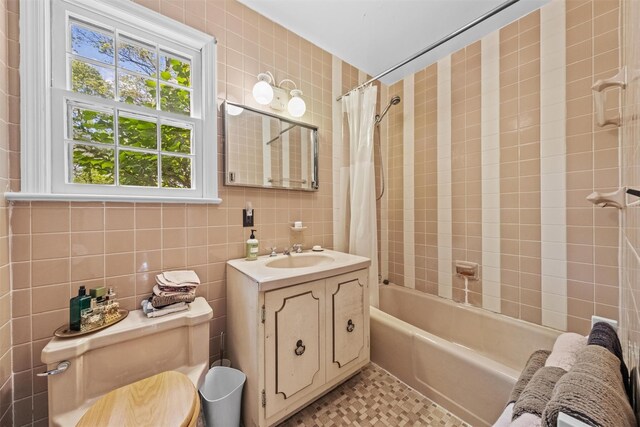 1391 Hunterbrook Rd, Yorktown Heights, NY 10598 - full bath with toilet, shower / bath combination with curtain, vanity, and tile walls