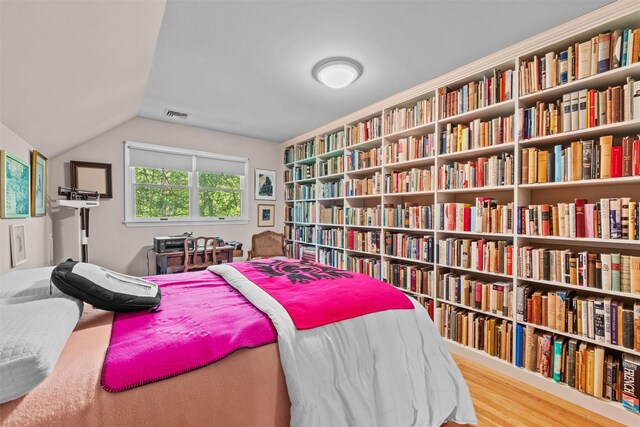 1391 Hunterbrook Rd, Yorktown Heights, NY 10598 - bedroom with lofted ceiling and wood finished floors