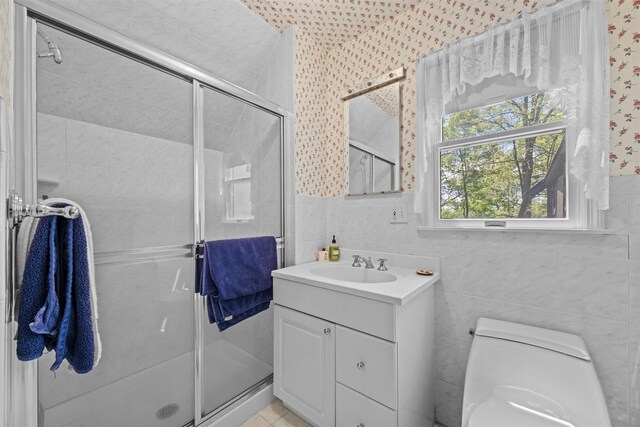 1391 Hunterbrook Rd, Yorktown Heights, NY 10598 - full bathroom with vanity, a shower stall, wallpapered walls, tile walls, and toilet