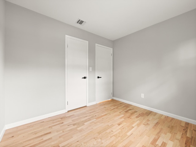 31 Pennsylvania Ave, Valley Cottage, NY 10989 - unfurnished bedroom with wood finished floors and baseboards