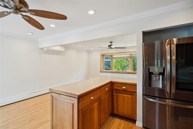 kitchen with light countertops, light wood-type flooring, a ceiling fan, and stainless steel fridge with ice dispenser