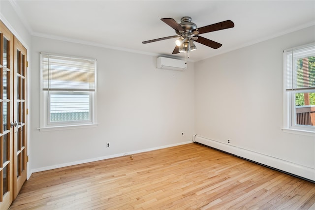 spare room with a baseboard radiator, a ceiling fan, crown molding, light wood-style flooring, and a wall unit AC