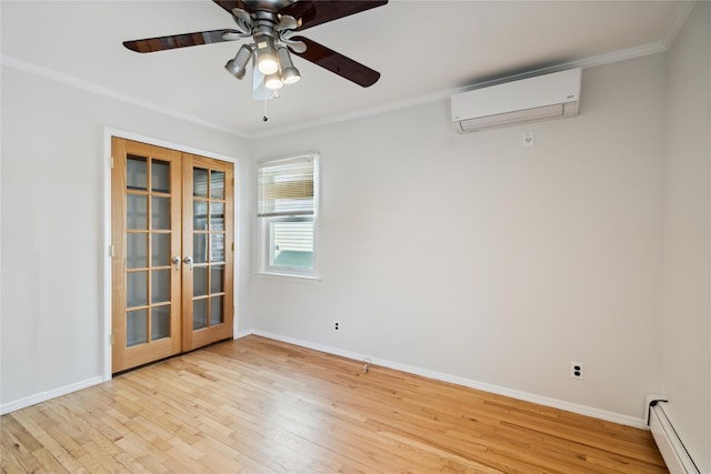 empty room featuring a wall unit AC, baseboard heating, ornamental molding, and french doors
