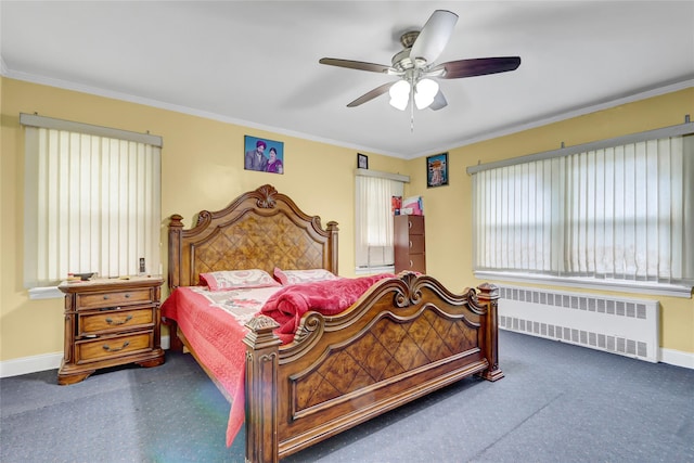 bedroom featuring baseboards, ornamental molding, and radiator