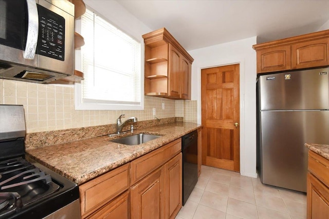 224-40 Fairbury Ave, Queens Village, NY 11428 - kitchen featuring decorative backsplash, light stone counters, a sink, and appliances with stainless steel finishes