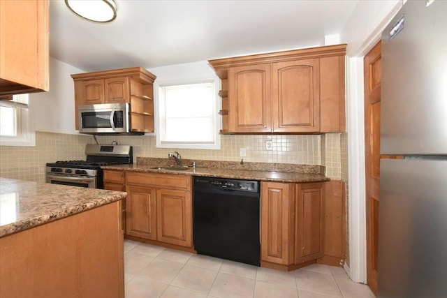 224-40 Fairbury Ave, Queens Village, NY 11428 - kitchen with a sink, tasteful backsplash, open shelves, light stone countertops, and appliances with stainless steel finishes