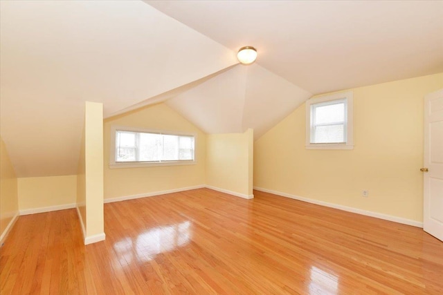 224-40 Fairbury Ave, Queens Village, NY 11428 - bonus room featuring lofted ceiling, light wood finished floors, and baseboards