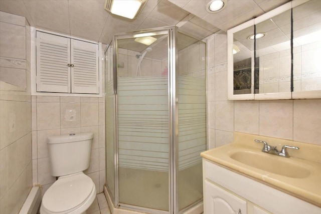 224-40 Fairbury Ave, Queens Village, NY 11428 - bathroom with tile walls, a stall shower, and toilet