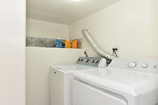 224-40 Fairbury Ave, Queens Village, NY 11428 - washroom featuring washing machine and dryer and laundry area