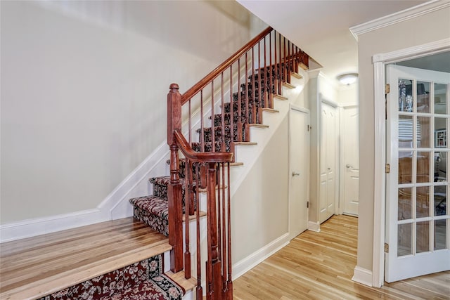 176 Kearsing Pkwy, Monsey, NY 10952 - stairway featuring wood finished floors, ornamental molding, and baseboards