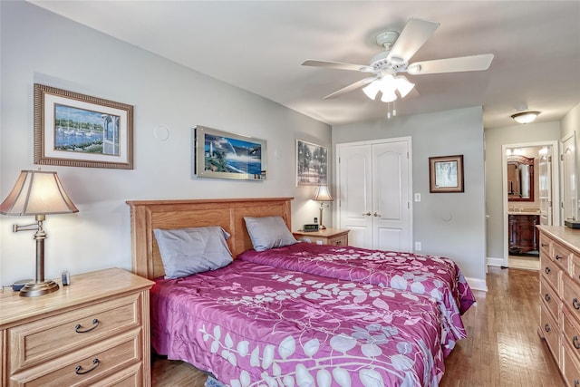 176 Kearsing Pkwy, Monsey, NY 10952 - bedroom featuring dark wood-style floors, a closet, baseboards, connected bathroom, and ceiling fan