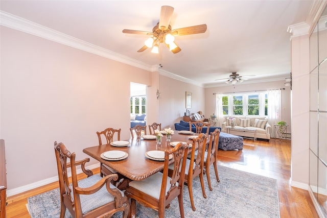 116 Oakland Ave, Tuckahoe, NY 10707 - dining room with a ceiling fan, ornamental molding, light wood-type flooring, and baseboards