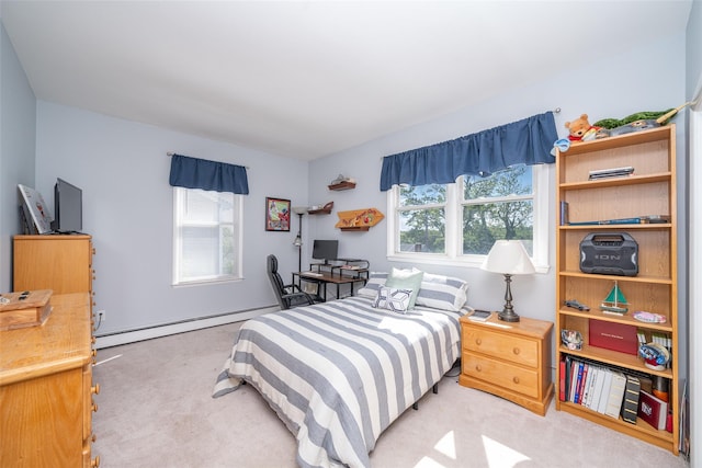 116 Oakland Ave, Tuckahoe, NY 10707 - carpeted bedroom featuring a baseboard heating unit and multiple windows