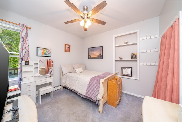 116 Oakland Ave, Tuckahoe, NY 10707 - bedroom featuring carpet floors, baseboard heating, ceiling fan, a desk, and baseboards