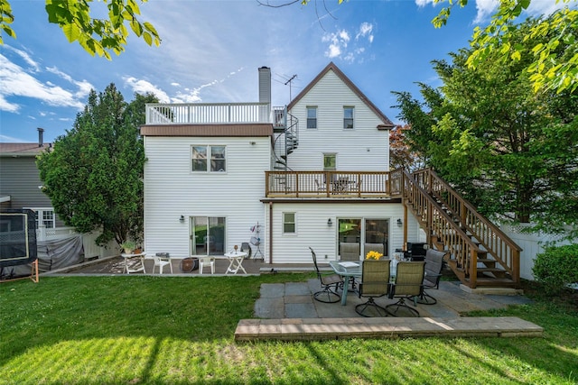 116 Oakland Ave, Tuckahoe, NY 10707 - rear view of house with stairway, a patio, a yard, a chimney, and a balcony