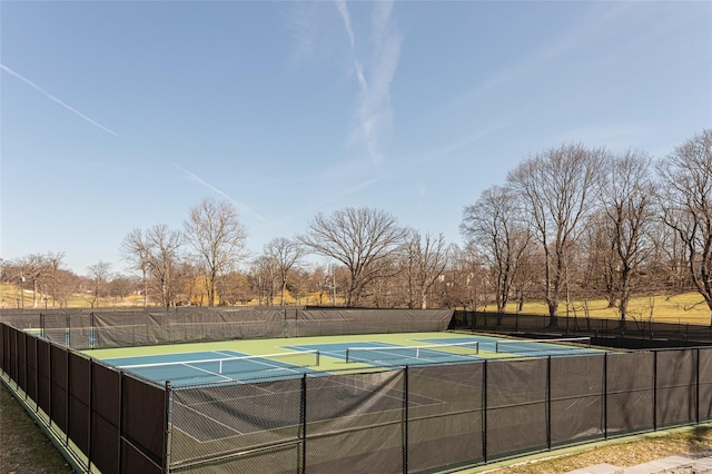 116 Oakland Ave, Tuckahoe, NY 10707 - view of tennis court with community basketball court and view of wooded area