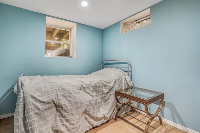 bedroom with recessed lighting and baseboards