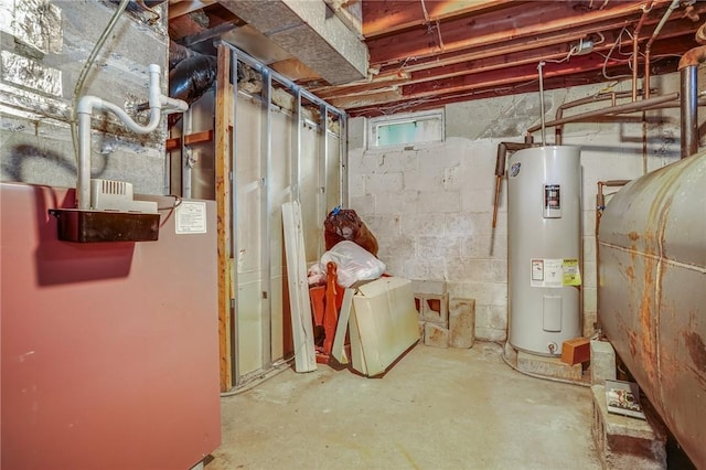 basement with heating fuel and electric water heater