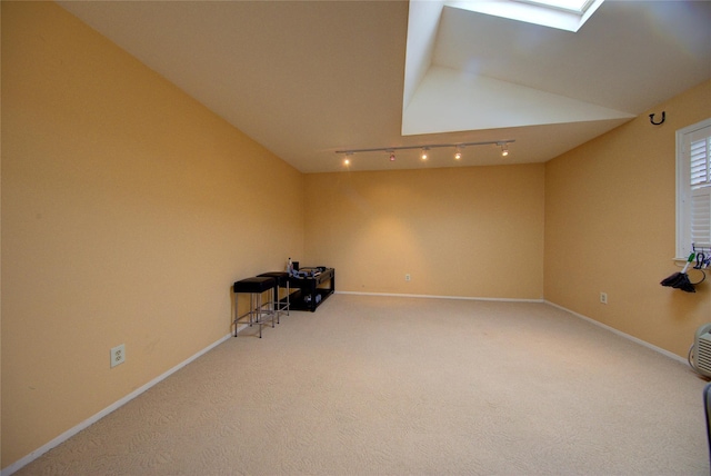 1337 Broadway Unit C22, Hewlett, NY 11557 - interior space featuring track lighting, carpet floors, lofted ceiling, and baseboards