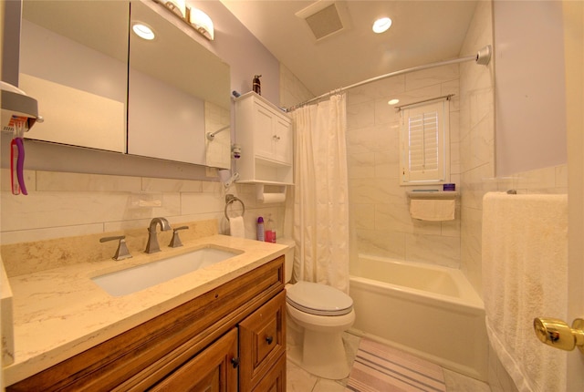 1337 Broadway Unit C22, Hewlett, NY 11557 - bathroom featuring tile walls, shower / bath combo with shower curtain, toilet, tile patterned flooring, and visible vents