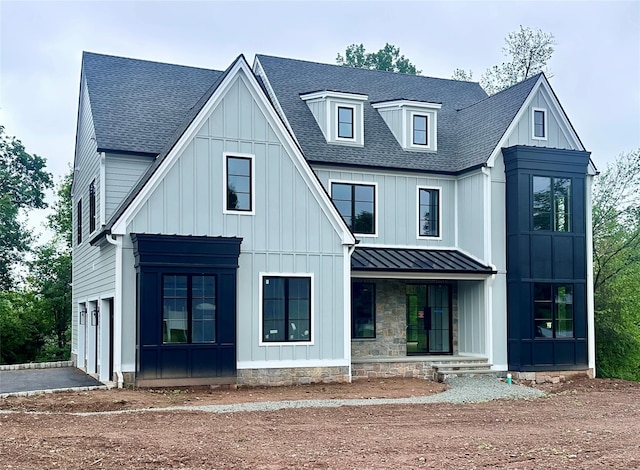 9 Ogrady Ct, Orangeburg, NY 10962 - modern inspired farmhouse featuring a standing seam roof, roof with shingles, metal roof, a porch, and board and batten siding