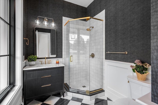 9 Ogrady Ct, Orangeburg, NY 10962 - bathroom with vanity, a shower stall, tile patterned flooring, and wainscoting