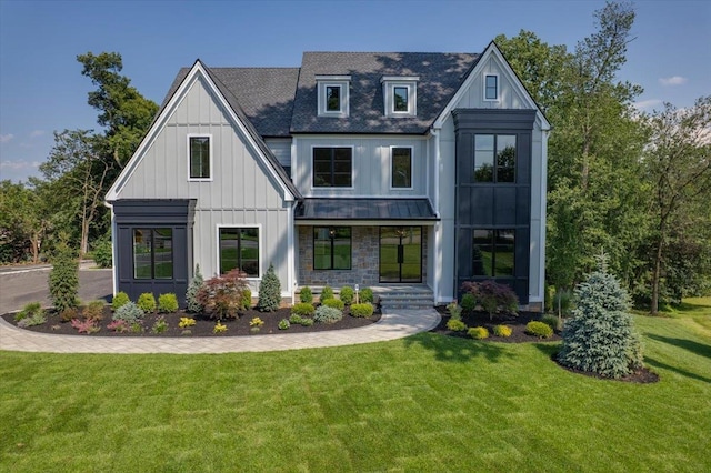 9 Ogrady Ct, Orangeburg, NY 10962 - modern inspired farmhouse with a standing seam roof, covered porch, board and batten siding, a metal roof, and a front yard