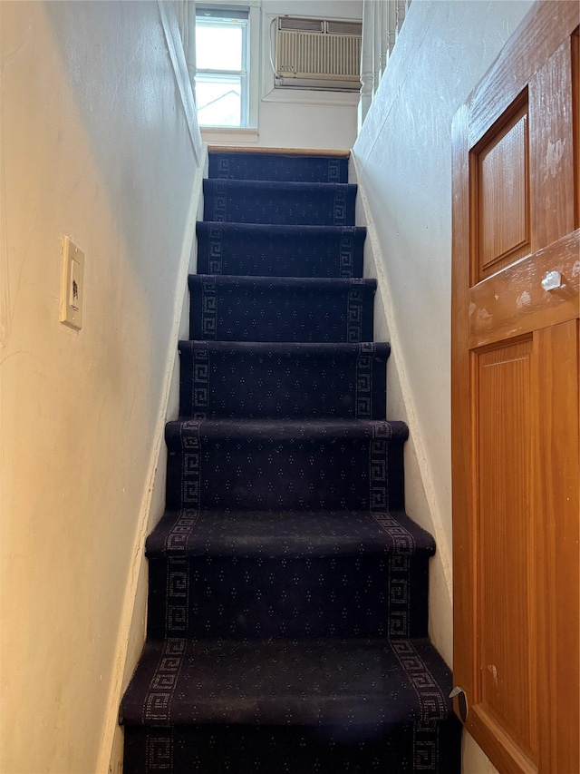 93-30 246th St, Bellerose Terrace, NY 11001 - stairs featuring a wall mounted AC