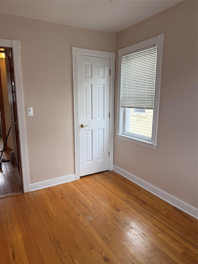 93-30 246th St, Bellerose Terrace, NY 11001 - unfurnished bedroom with light wood-type flooring and baseboards