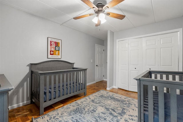 372 Central Park Ave Unit 1C, Scarsdale, NY 10583 - bedroom with a closet, a ceiling fan, and a nursery area