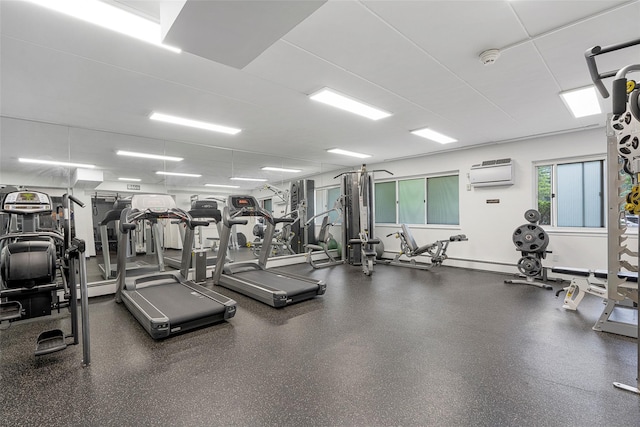 372 Central Park Ave Unit 1C, Scarsdale, NY 10583 - gym featuring a wall mounted air conditioner