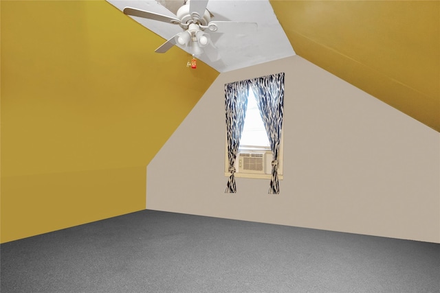 bonus room featuring vaulted ceiling, carpet flooring, and ceiling fan