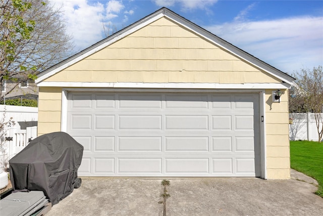 detached garage with fence