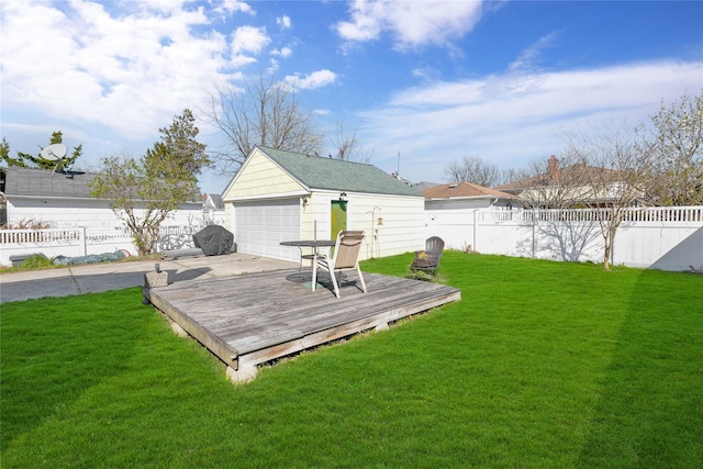 exterior space featuring a wooden deck, a garage, fence, and an outdoor structure
