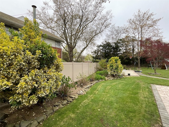 view of yard with fence