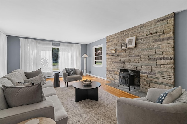 200 Fort Hill Rd, Scarsdale, NY 10583 - living area featuring wood finished floors and a wood stove