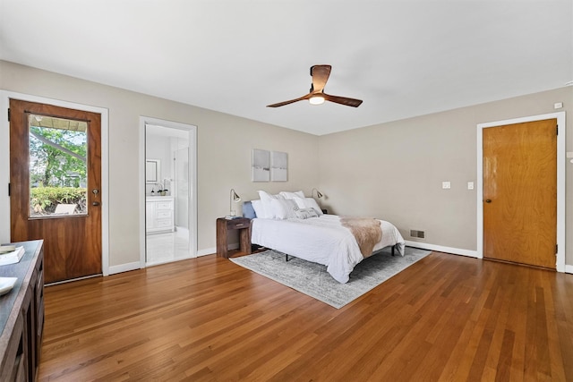200 Fort Hill Rd, Scarsdale, NY 10583 - bedroom featuring wood finished floors, baseboards, and ensuite bath